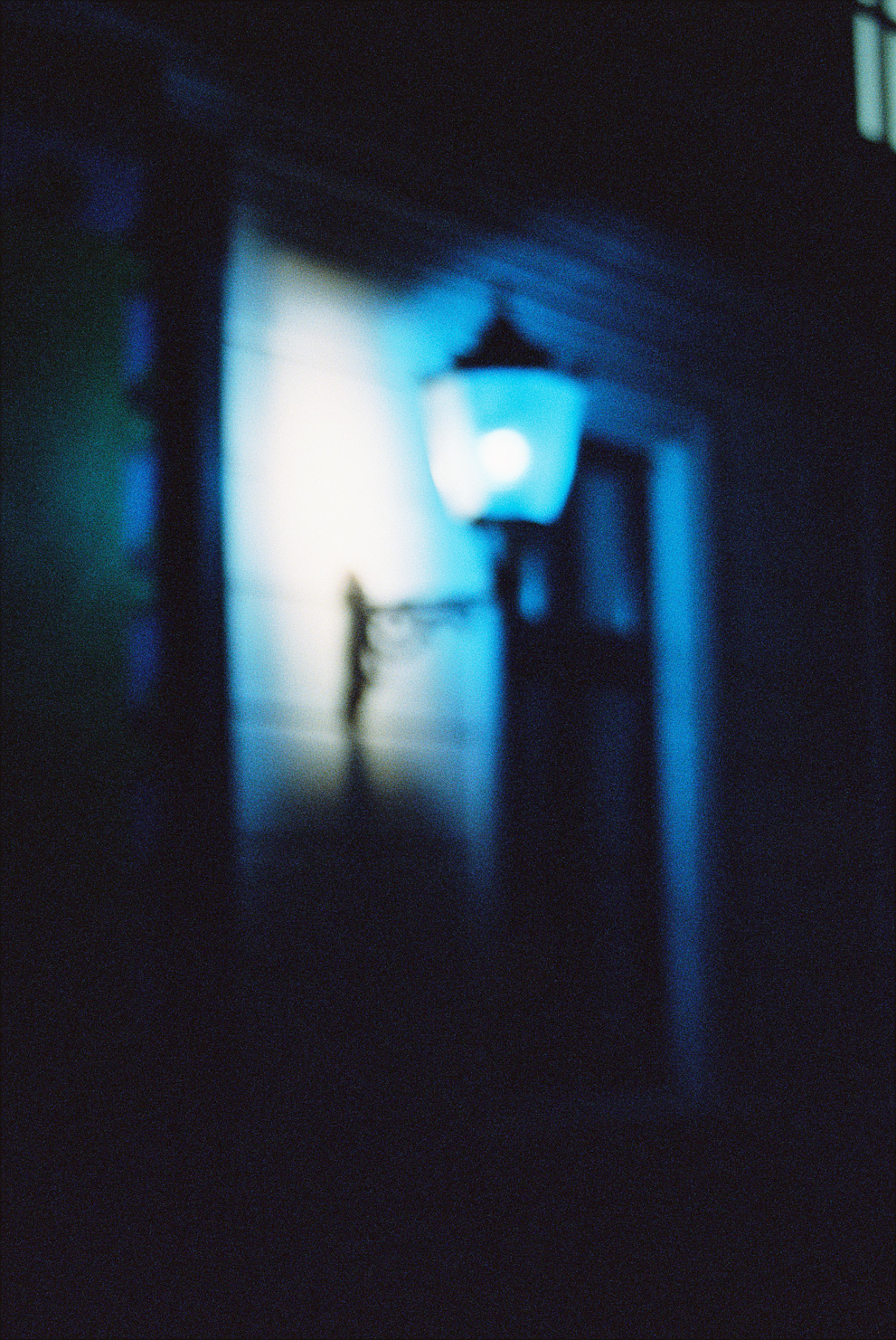 A blue latern out of focus.  Shot on Cinestille 800T.