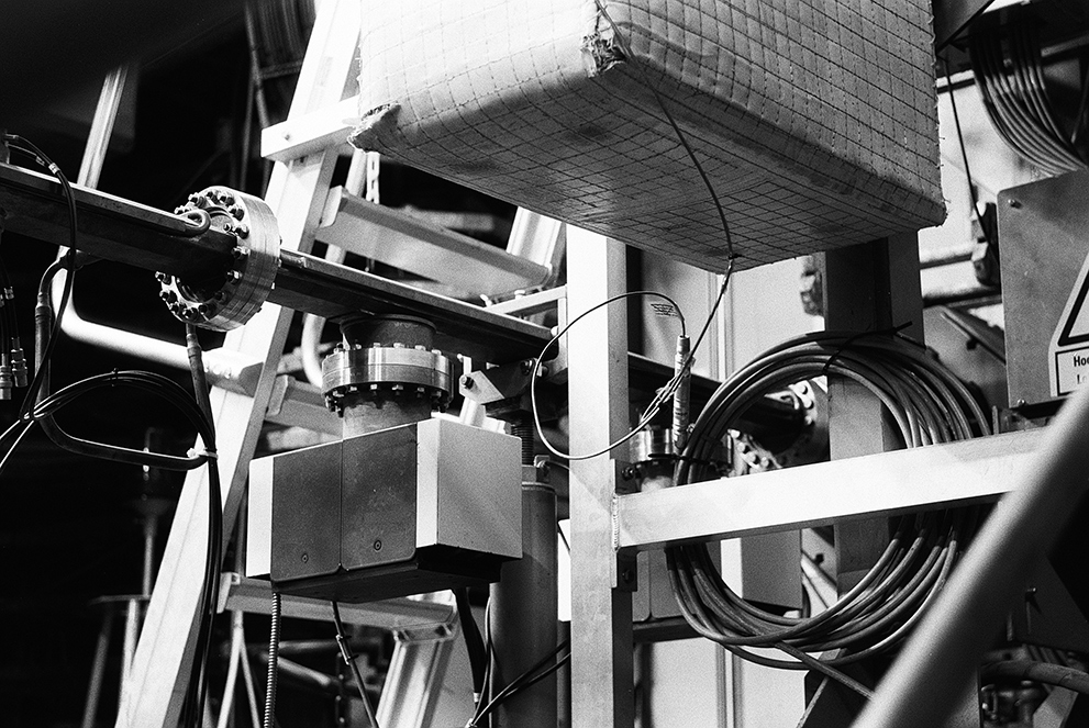 Many strange devices are visible in the close-up of a particle accelerator. Shot on Fomapan 100 classic.