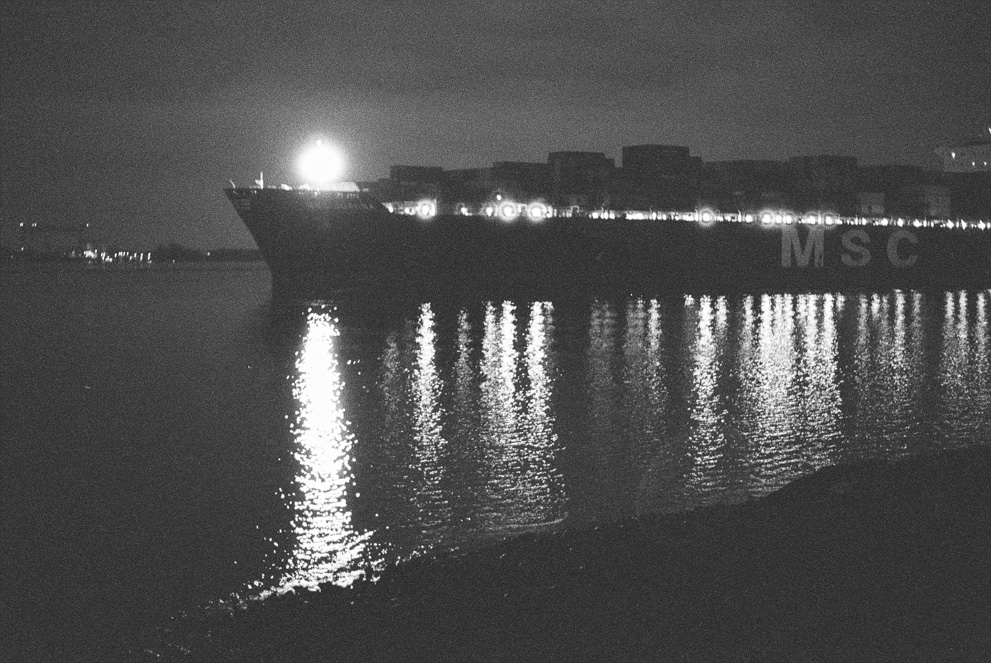 Container ship on the river Elbe at night. Shot on Ilford Delta 3200