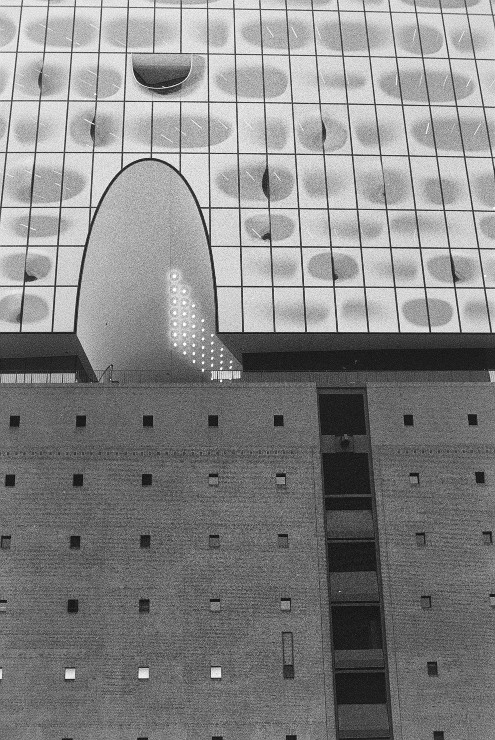 Detailed architecture image of the Elbphilharmonie. Shot on Ilford Delta 3200