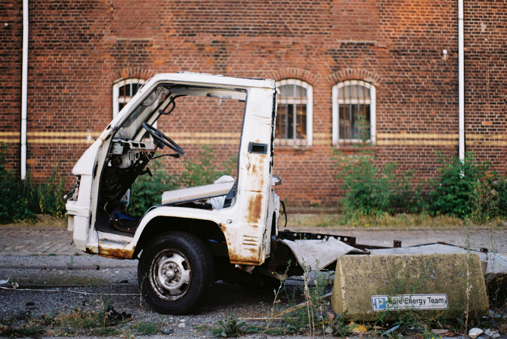 A total wrecked delivery truck. Shot on Kodak Gold 200.