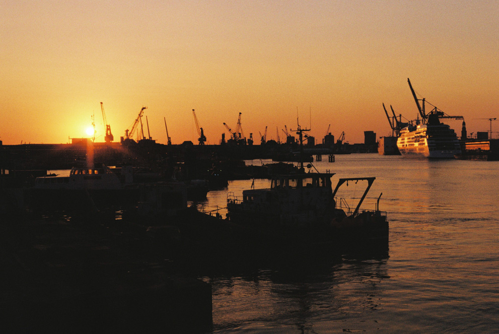 The sun setting on the Hamburg Port. Shot on Kodak Gold 200.